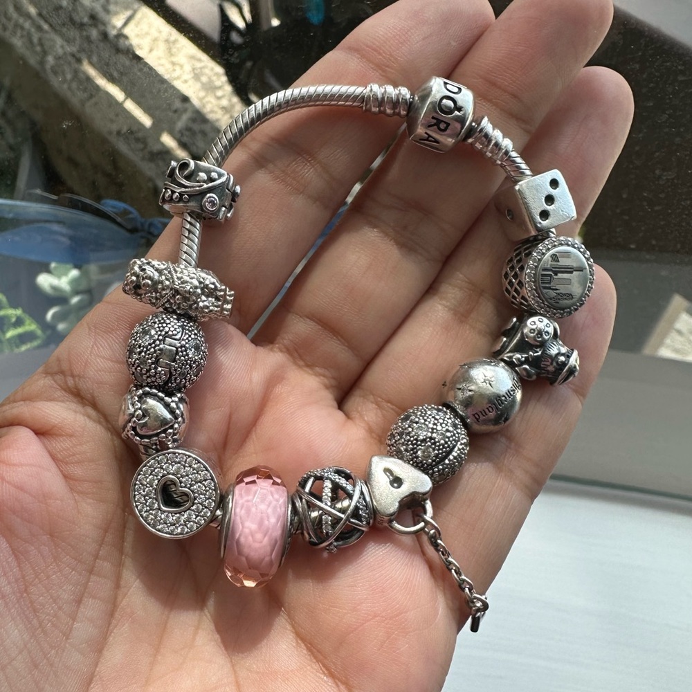 PANDORA BRACELET with 13 charms/clasps OVER $1000 worth